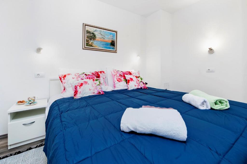 Łóżko lub łóżka w pokoju w obiekcie Holiday Home Fradelani