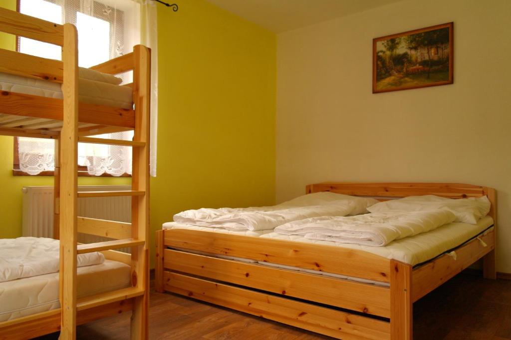 Postel nebo postele na pokoji v ubytování Ubytování Macků