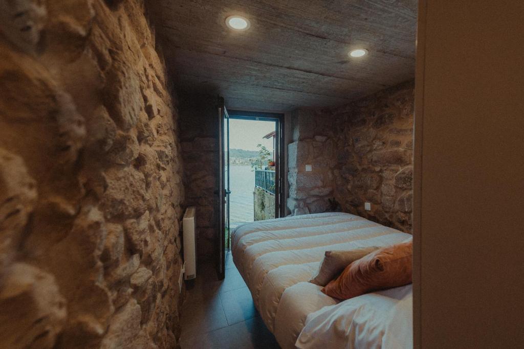 A bed or beds in a room at GALIHOST - Maraxe 45