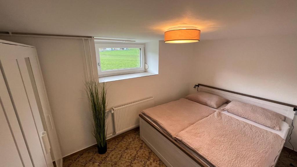 Posteľ alebo postele v izbe v ubytovaní Ferienhaus Traunsteinblick