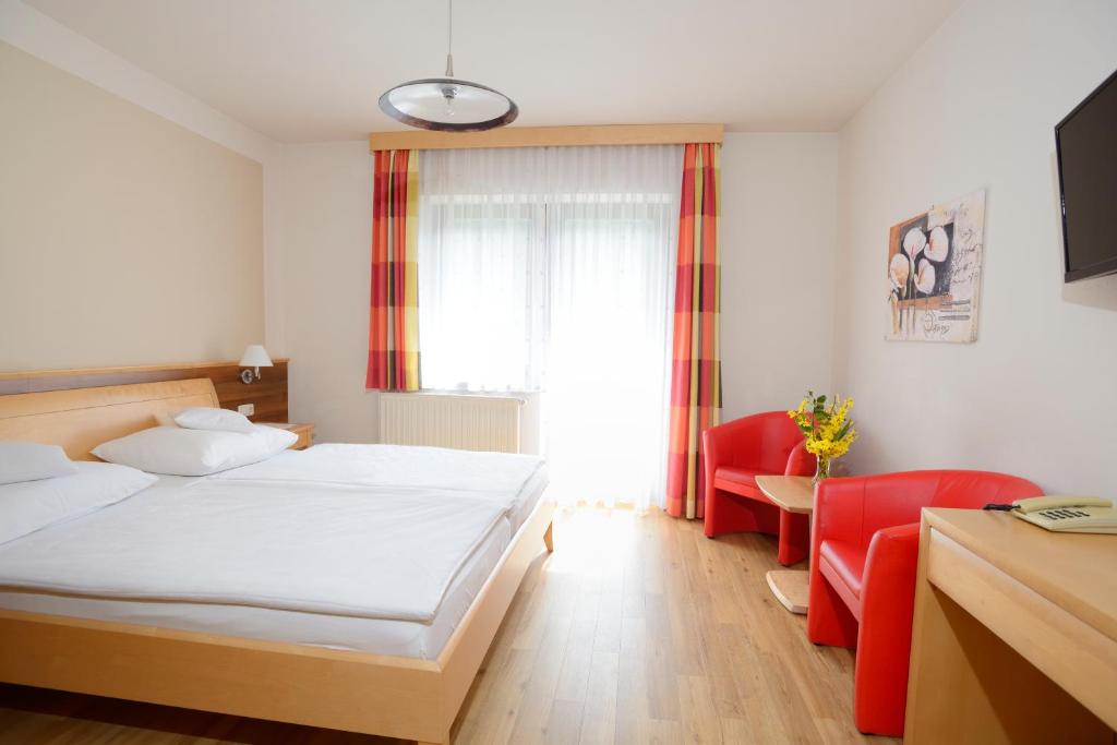 Postel nebo postele na pokoji v ubytování Hotel Mönichwalderhof