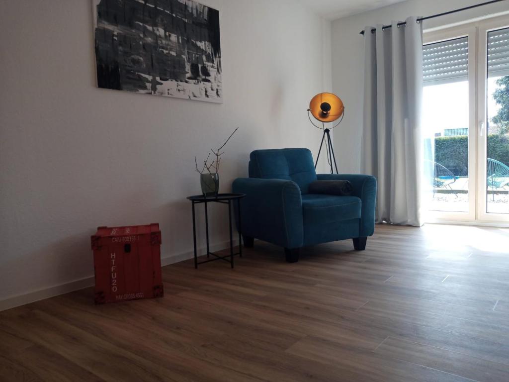 Posezení v ubytování 5 Sterne Ferienwohnung Dünensand