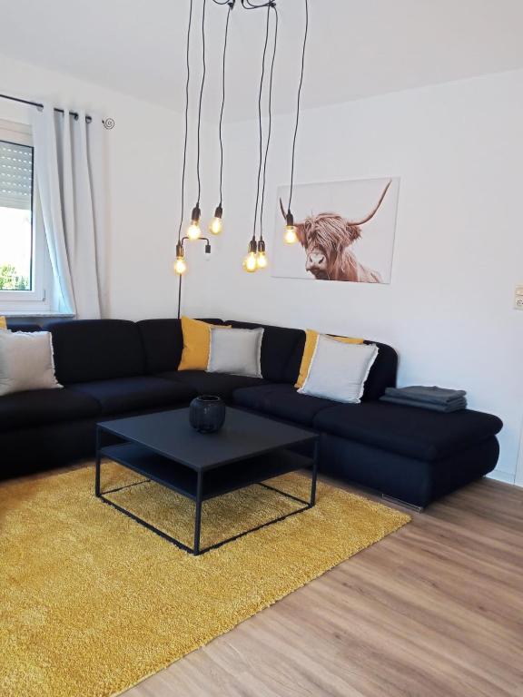 Posezení v ubytování 5 Sterne Ferienwohnung Dünensand