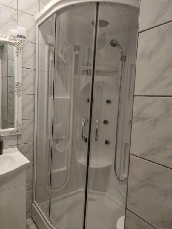 A bathroom at Wagner Apartman Tata