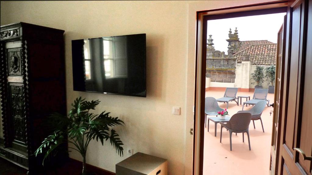 Nava Suites TV 또는 엔터테인먼트 센터