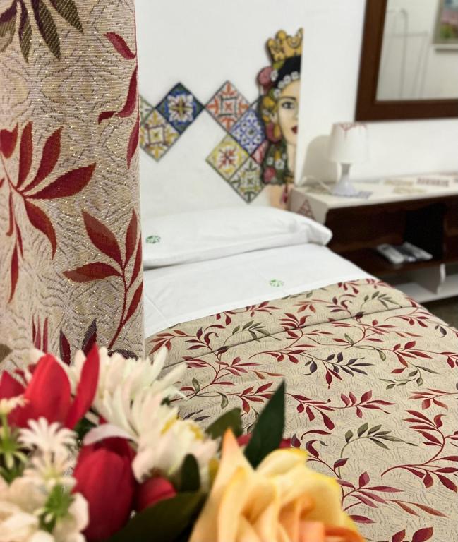 Letto o letti in una camera di B&B 091