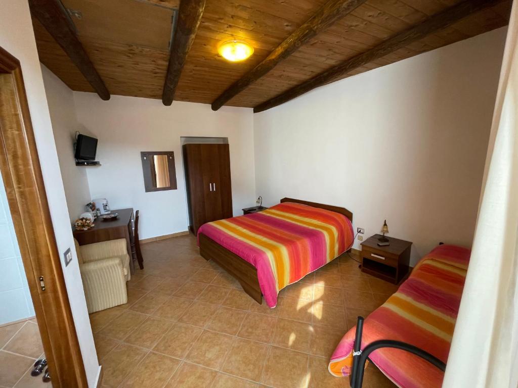 Posteľ alebo postele v izbe v ubytovaní B&B Antica Locanda San Ciriaco