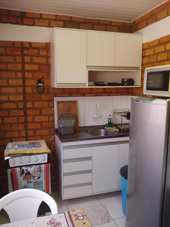 Kuchyň nebo kuchyňský kout v ubytování Porto dos Lencóis - Chalé Tipo Apartamento