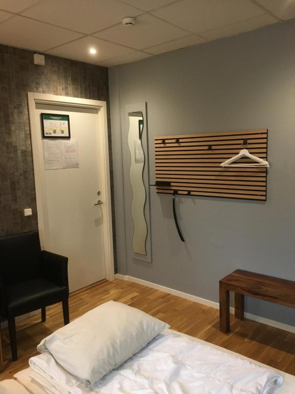 Postel nebo postele na pokoji v ubytování Hostel Snoozemore