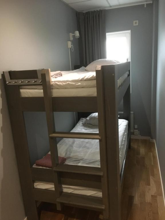 Postel nebo postele na pokoji v ubytování Hostel Snoozemore