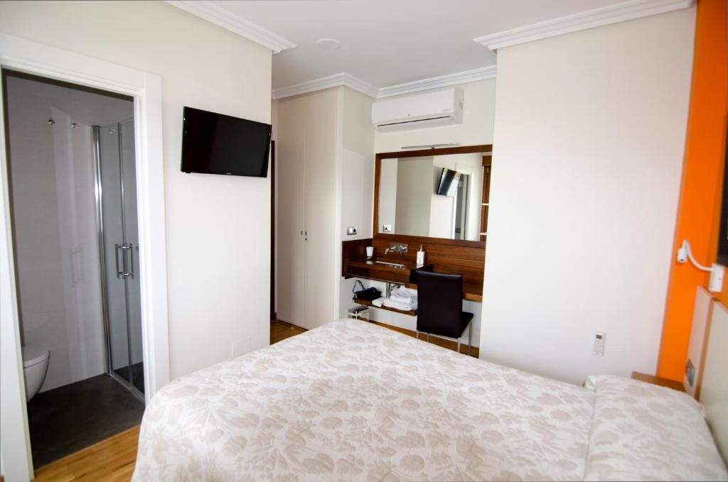 Postel nebo postele na pokoji v ubytování B&B Zaldu