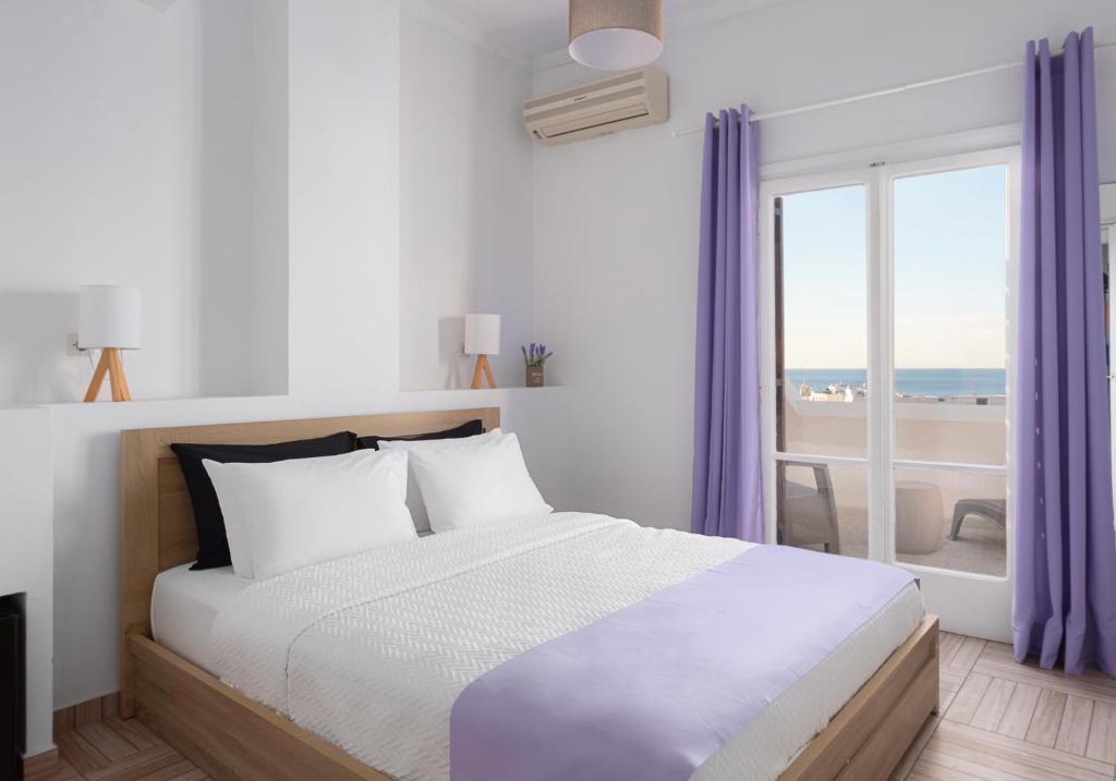 Postel nebo postele na pokoji v ubytování Venus Minimal Hotel
