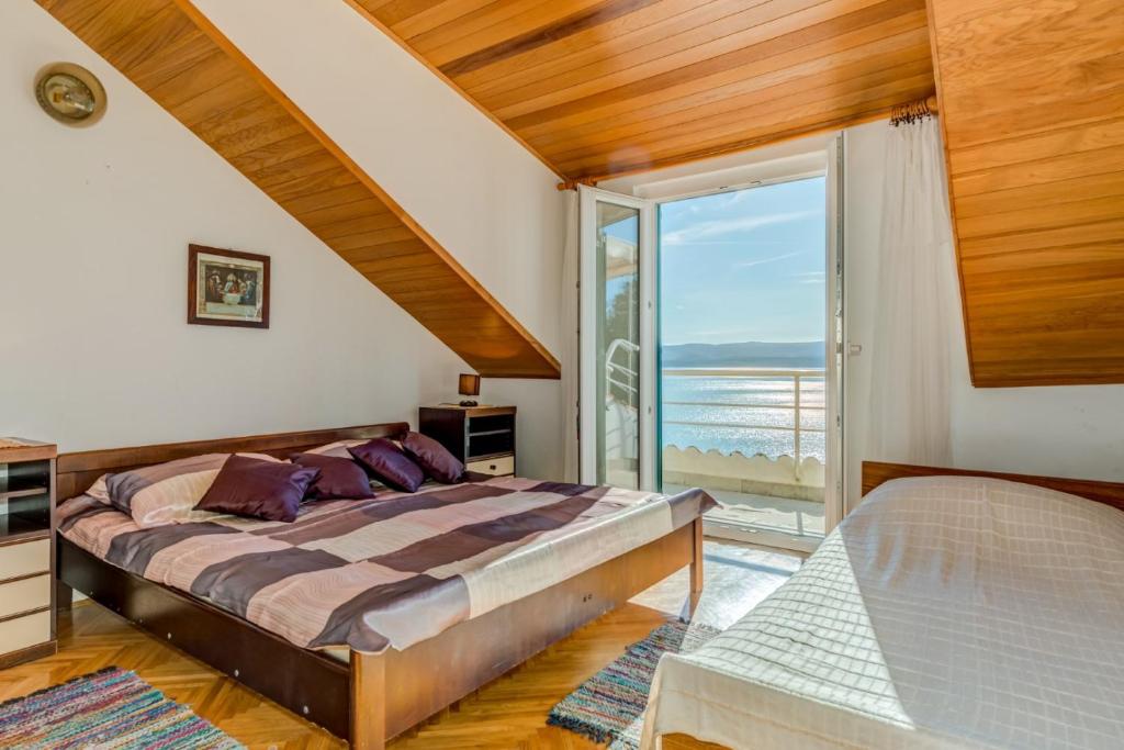 Postel nebo postele na pokoji v ubytování VILLA LEON***