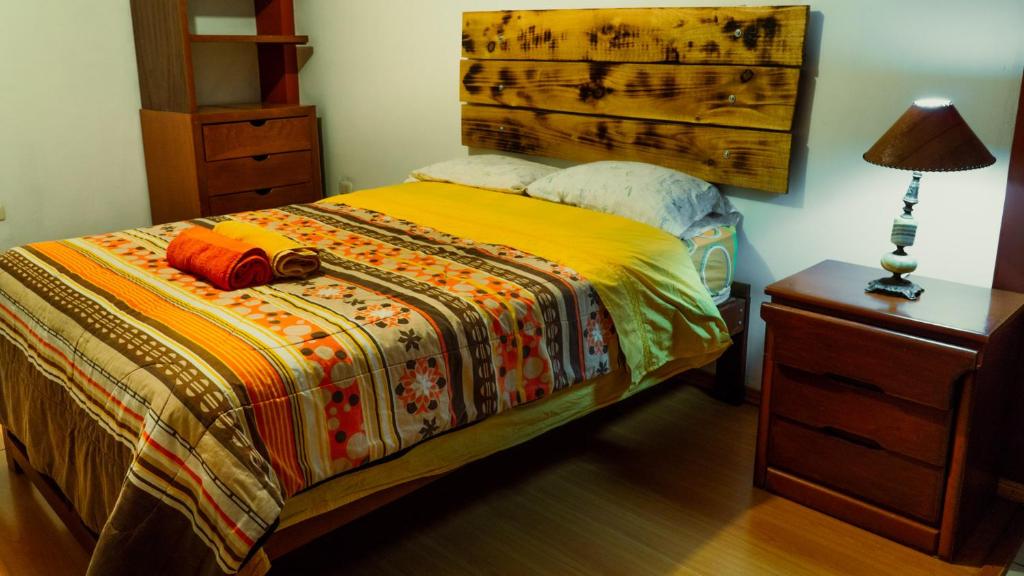Postel nebo postele na pokoji v ubytování Kame House hostel