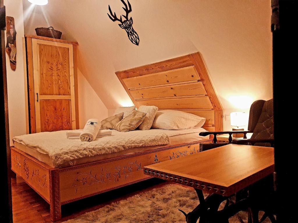 Posteľ alebo postele v izbe v ubytovaní Apartament Rykowisko