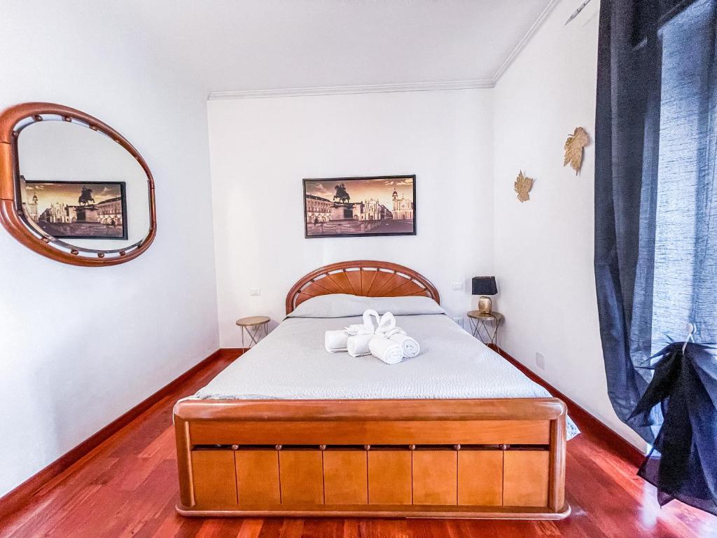 A bed or beds in a room at MYHOUSE INN PORTA NUOVA - Affitti Brevi Italia