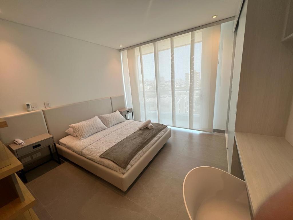 Distrito 90 - Estudios y Apartamentos para vacaciones y viajes de negocio - Apartamento De Estudio