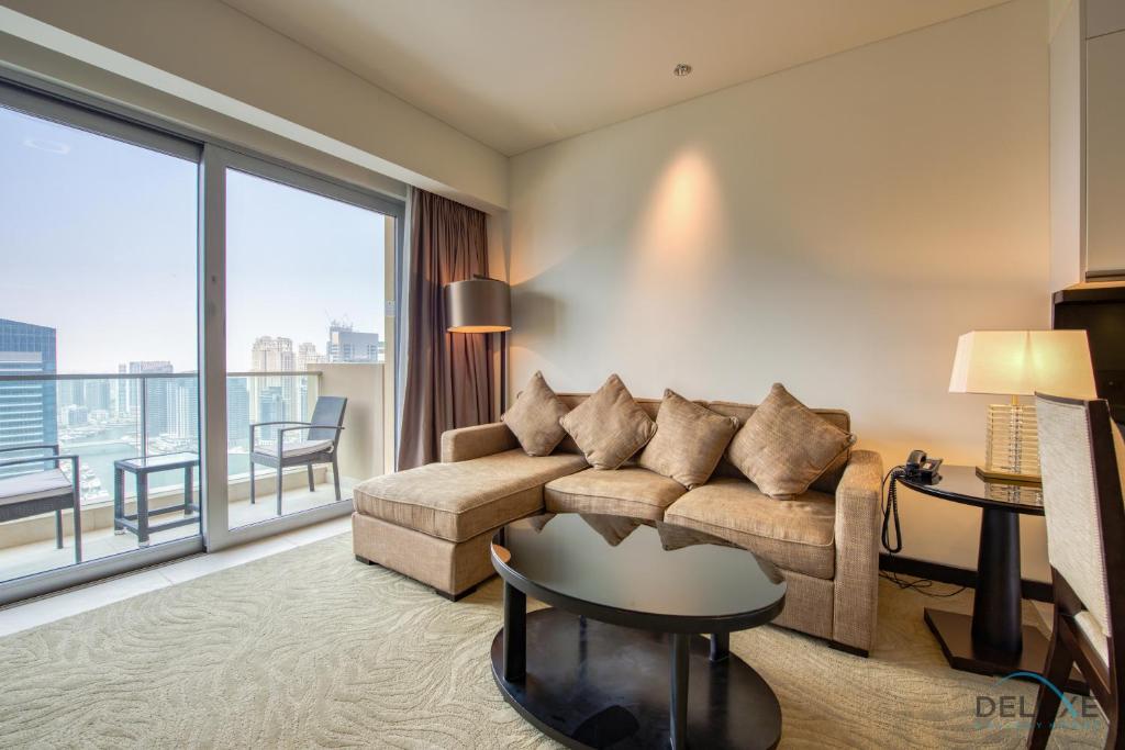 Posezení v ubytování Exceptional 1BR at The Address Residences Dubai Marina by Deluxe Holiday Homes