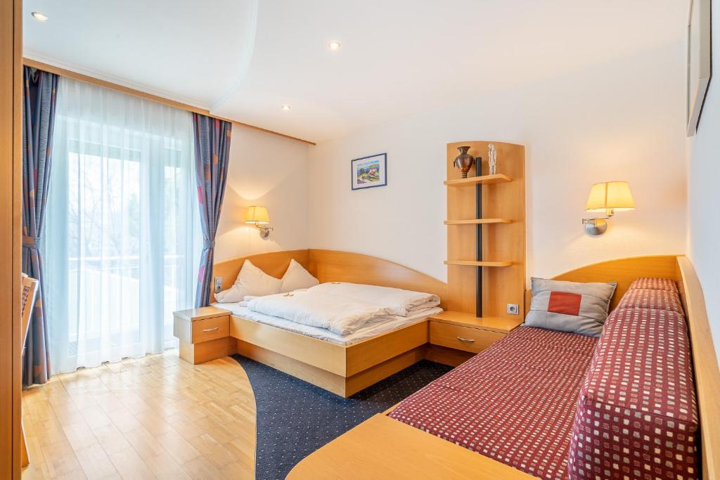 Łóżko lub łóżka w pokoju w obiekcie Dietrich Comfort Appartements