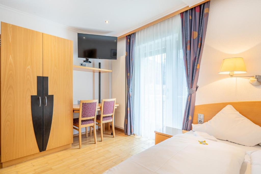 Łóżko lub łóżka w pokoju w obiekcie Dietrich Comfort Appartements