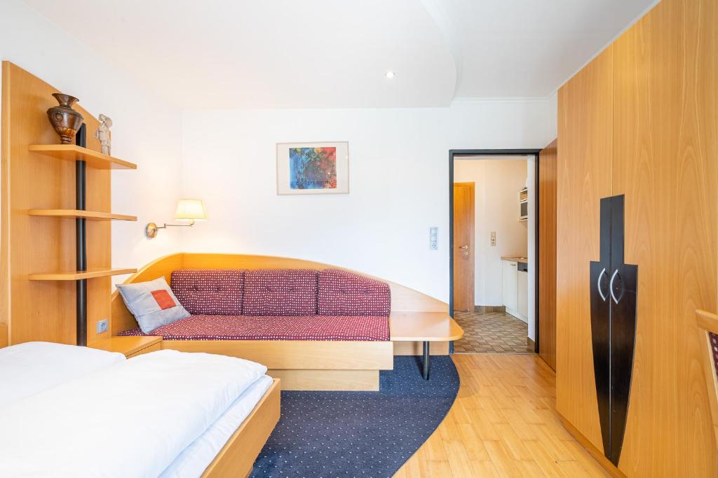 Łóżko lub łóżka w pokoju w obiekcie Dietrich Comfort Appartements