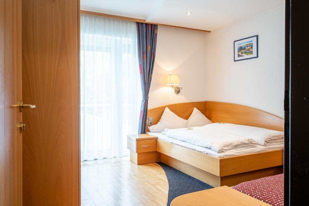 Łóżko lub łóżka w pokoju w obiekcie Dietrich Comfort Appartements