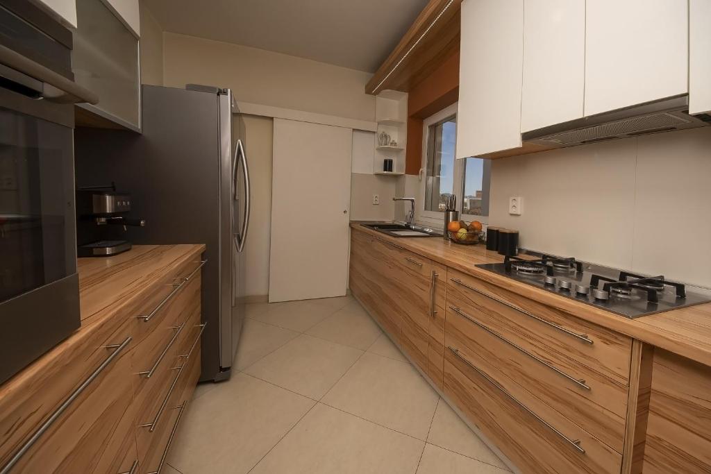 Kuchyň nebo kuchyňský kout v ubytování Whitestone Villa