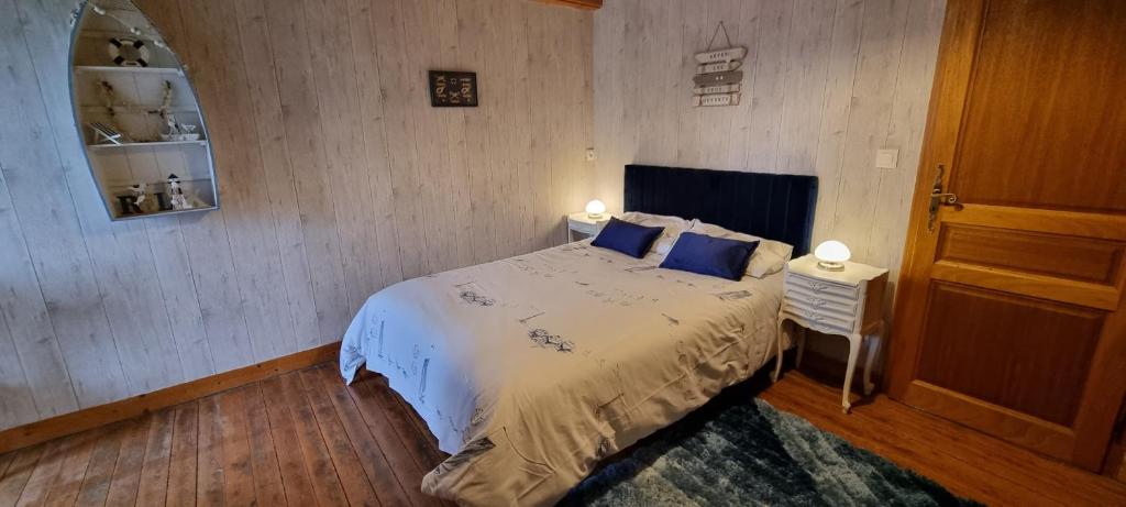 Postel nebo postele na pokoji v ubytování Le Relais de la Comté