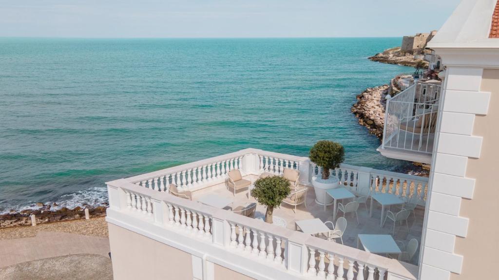 a balcony with a view of the ocean at Tra Cielo e Mare in Vieste