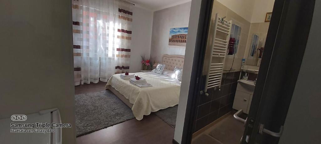 Posteľ alebo postele v izbe v ubytovaní Appartamento Natalia Verona