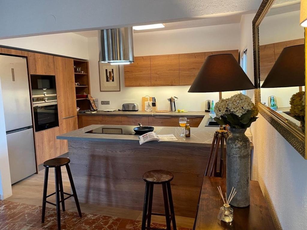 A kitchen or kitchenette at Casa Pera