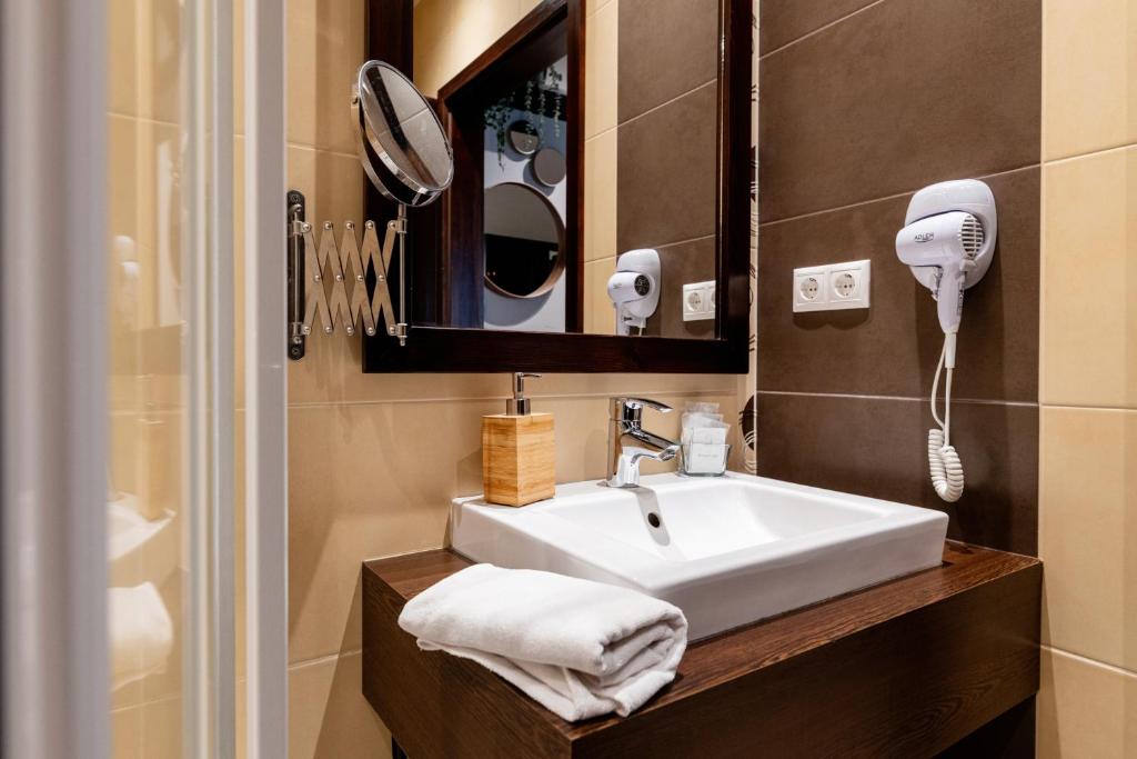 Posteľ alebo postele v izbe v ubytovaní Templomvölgy Butik Hotel Mátrakeresztes
