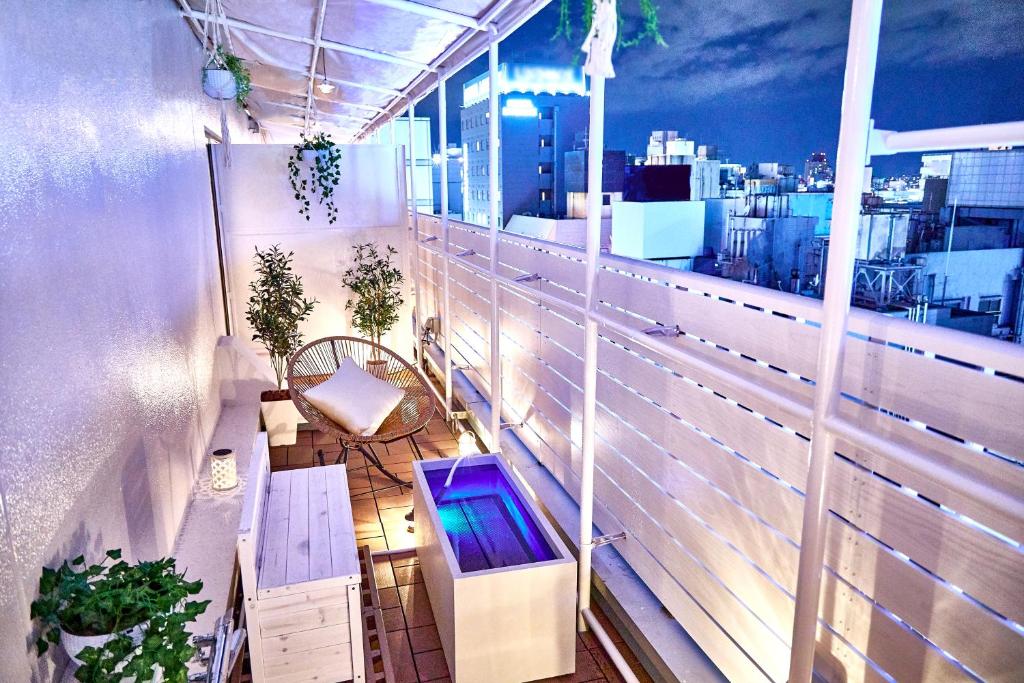 Balkón nebo terasa v ubytování Hotel BaliAn Resort Shinjuku Glamping