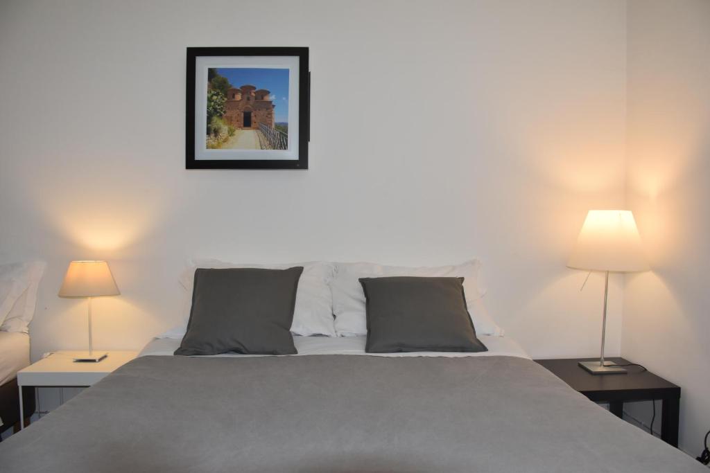 Postel nebo postele na pokoji v ubytování Rhegion B&B