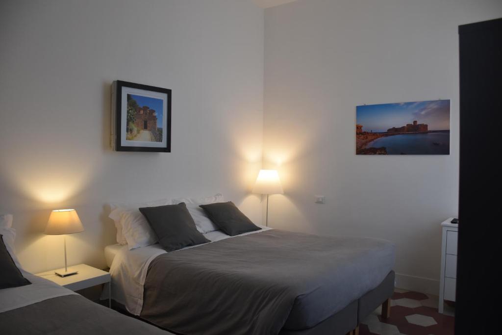 Postel nebo postele na pokoji v ubytování Rhegion B&B