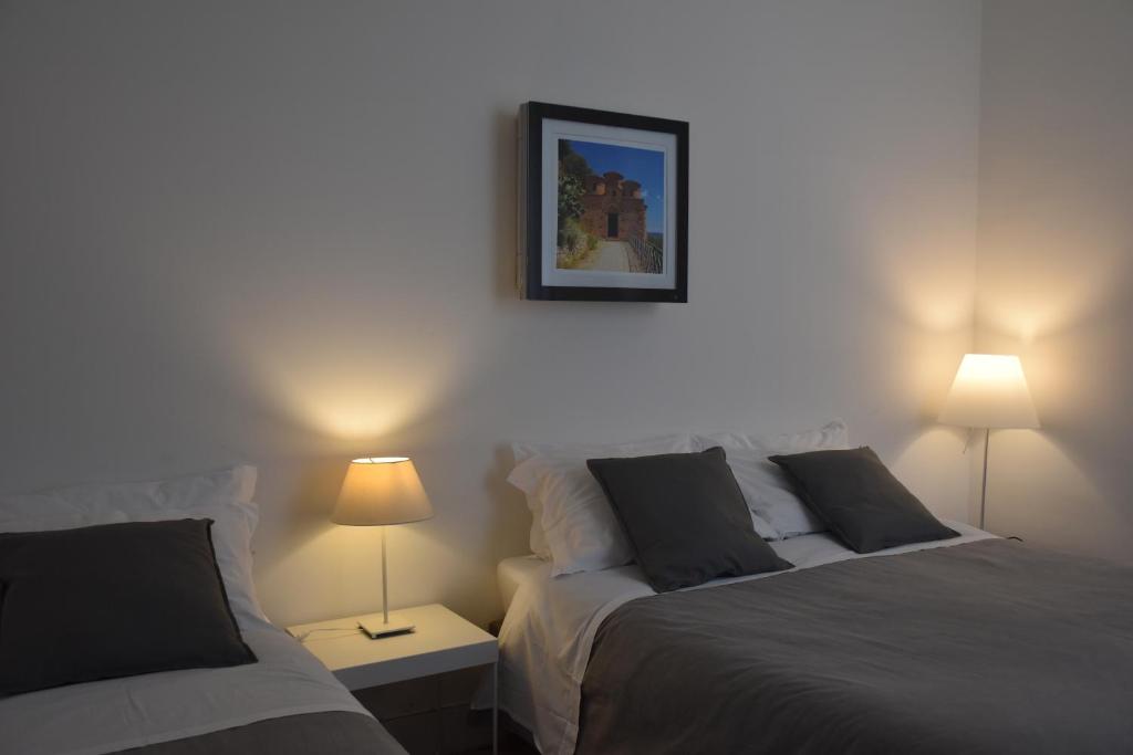 Postel nebo postele na pokoji v ubytování Rhegion B&B