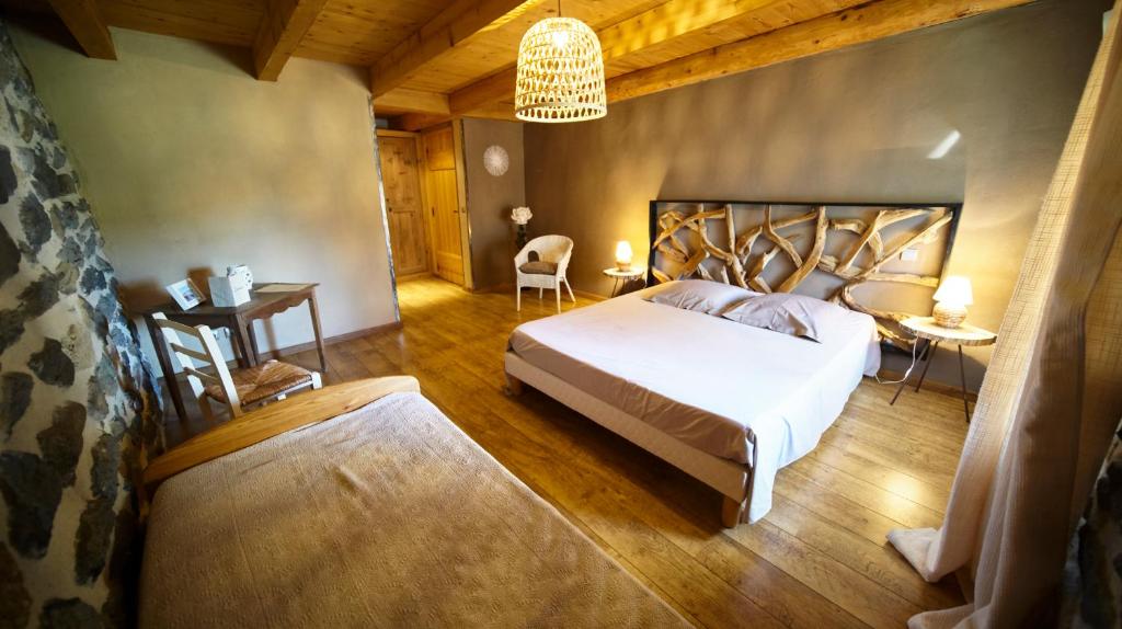 Postel nebo postele na pokoji v ubytování SUCHASSON EXCEPTIONNEL GITE DE 400 M2