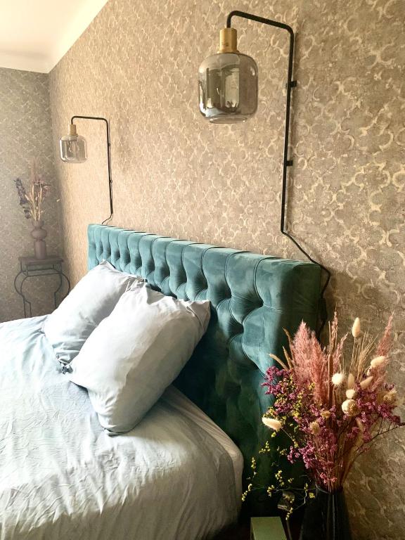 Postel nebo postele na pokoji v ubytování B&B Vrijheid 4