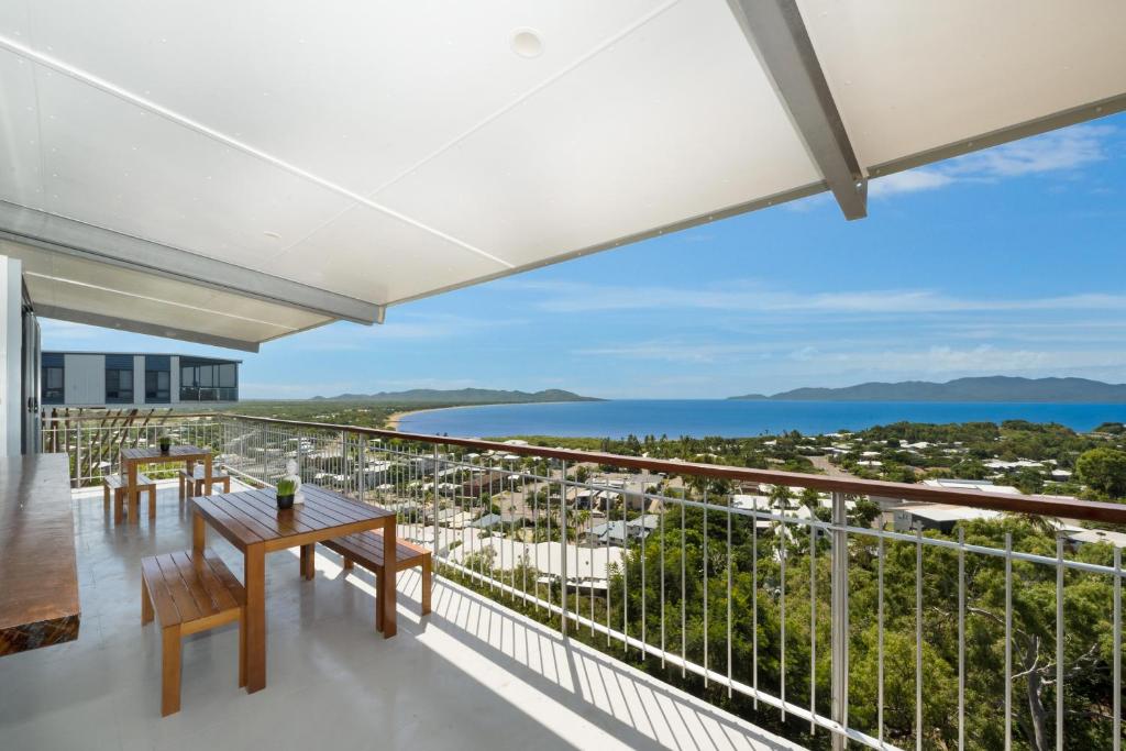a balcony with a view of the ocean at SEA-Renity on Castle Hill in Townsville