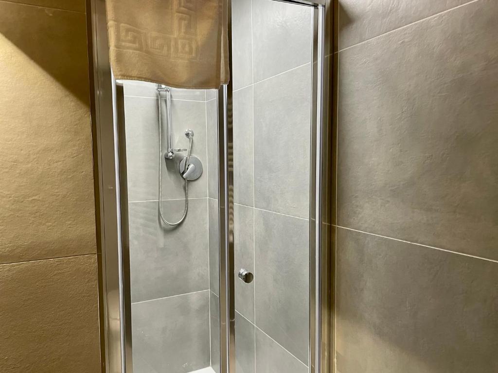 a shower with a glass door in a bathroom at ALLA QUERCIA - CENTRO STORICO in Monterotondo