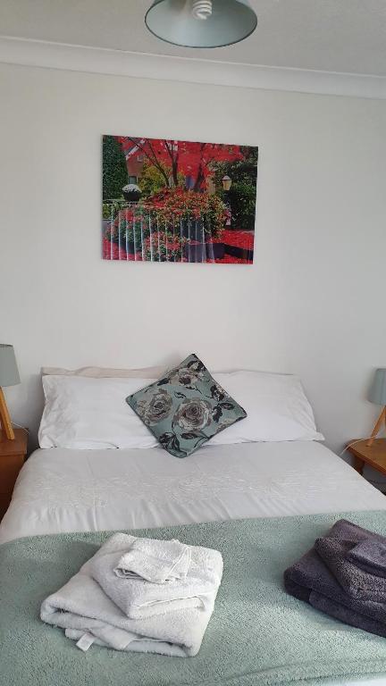 Postel nebo postele na pokoji v ubytování Tranquility