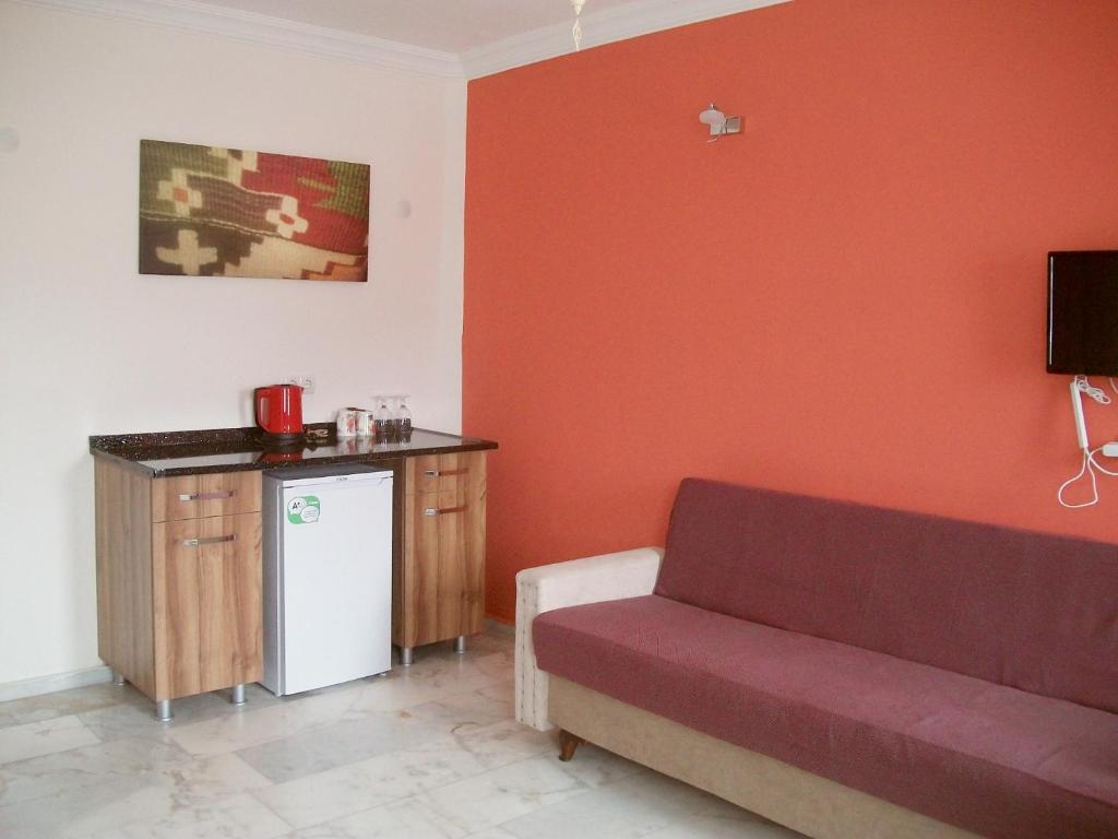 TV a/nebo společenská místnost v ubytování Loya Vita Hotel