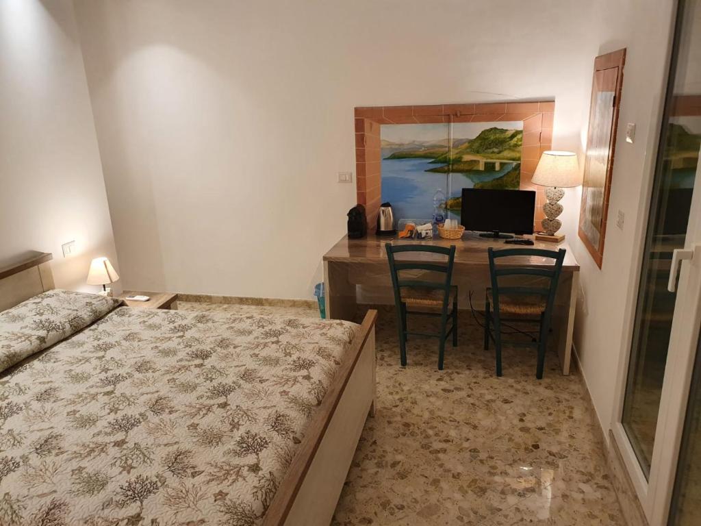 Postel nebo postele na pokoji v ubytování Stella Maris