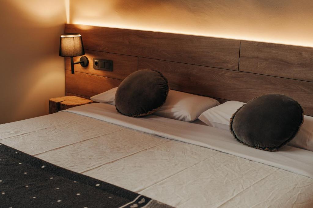 Postel nebo postele na pokoji v ubytování Hotel Boutique El Mariner