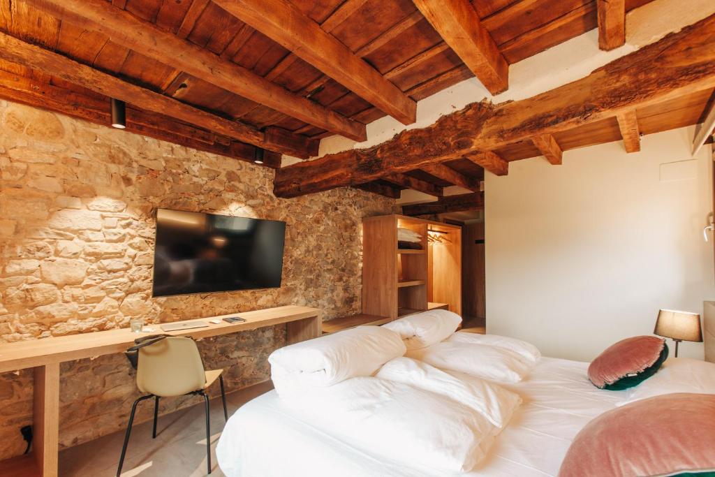 Postel nebo postele na pokoji v ubytování Hotel Boutique El Mariner