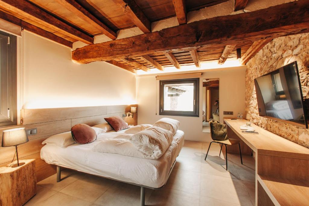 TV a/nebo společenská místnost v ubytování Hotel Boutique El Mariner