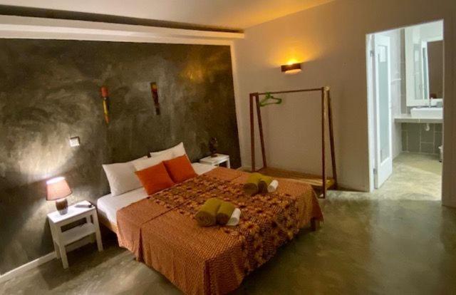 Postel nebo postele na pokoji v ubytování Hotel Kriola