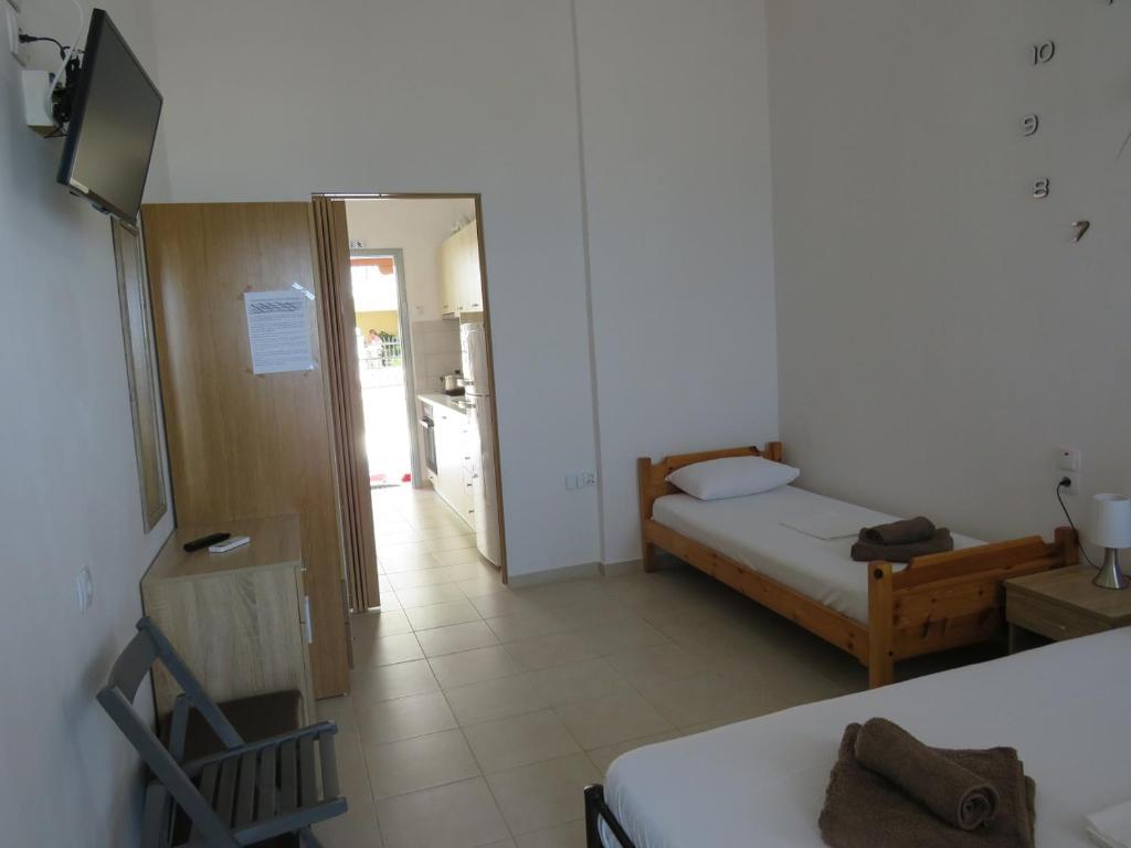 Postel nebo postele na pokoji v ubytování George rooms