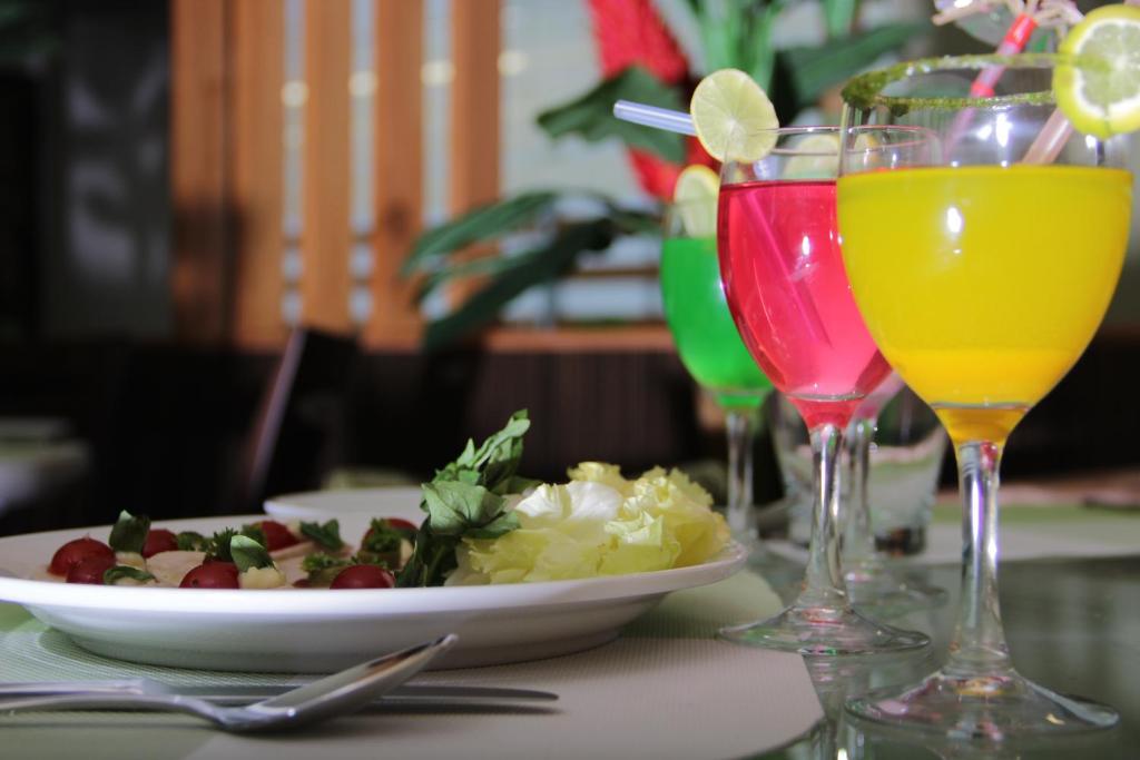 Nápoje v ubytování Hotel Green Olive