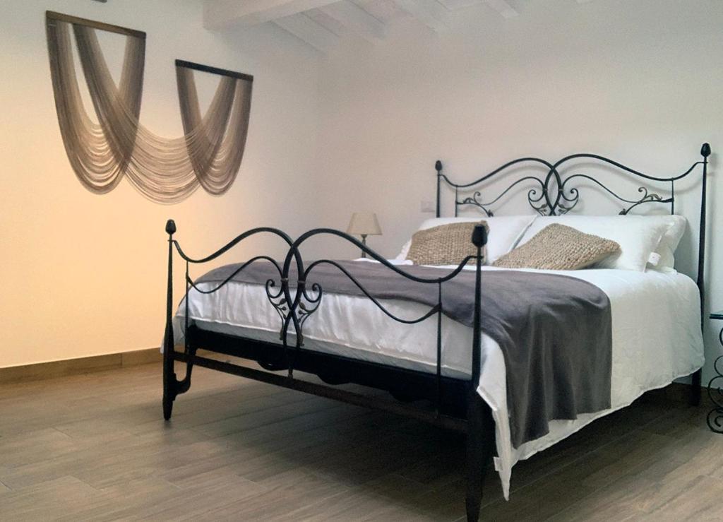 Posteľ alebo postele v izbe v ubytovaní ComfortHouse Ladispoli